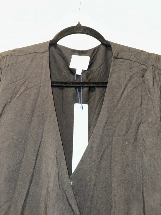 KOKO+MASON Black V-neck
Asymmetric Ruffle Hem
Butterfly Sleeve Wrap Dress
XL - Picture 3 of 6